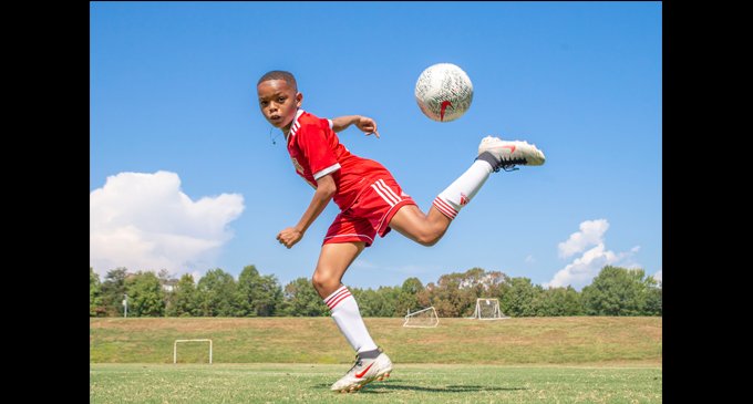Young athlete focuses in on the game of soccer