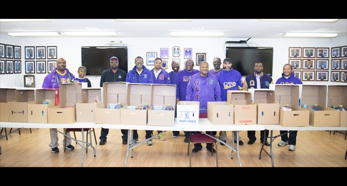 Local fraternity provides Thanksgiving boxes for the needy