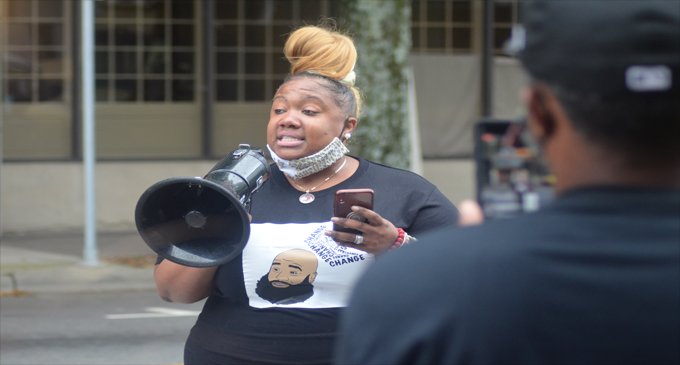 Widow of Julius Sampson speaks during Stand Your Ground law protest