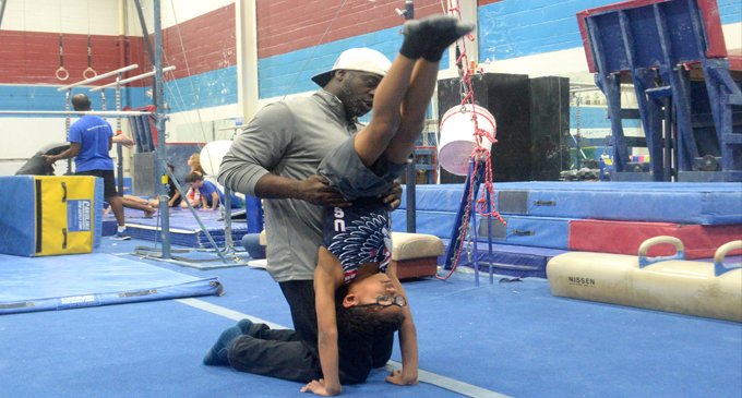 Team USA qualifier coaches son to  state gymnastics title