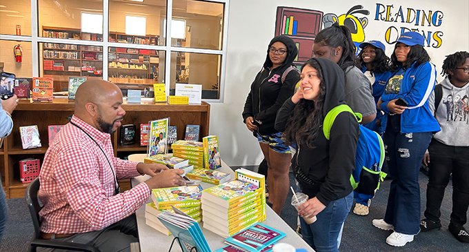 R. Eric Thomas addresses more than 100 students at Carver High School for 18th Bookmarks Festival