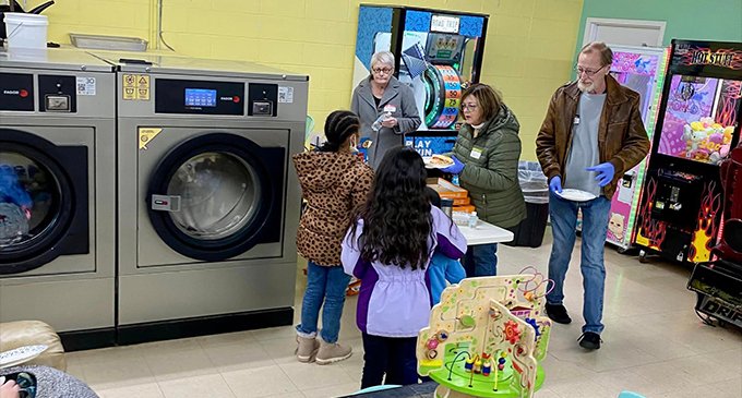 Laundry Love provides clean clothes, pizza and prayer as outreach project