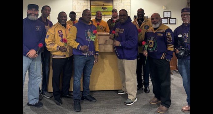 Omegas play ‘Que-Pid’ handing out roses at senior center