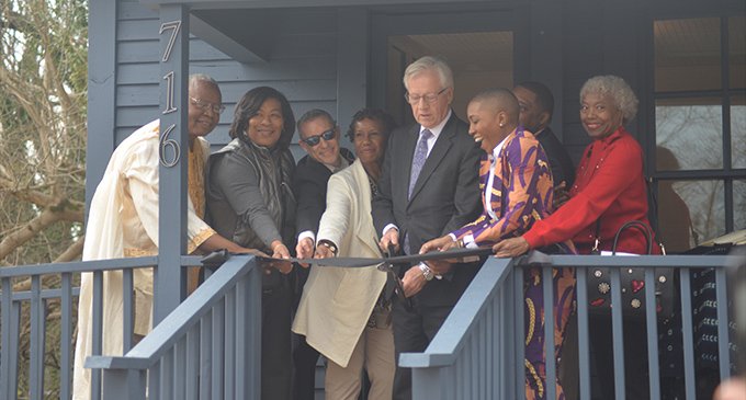 Ribbon cutting held for first restored shotgun house in Happy Hill
